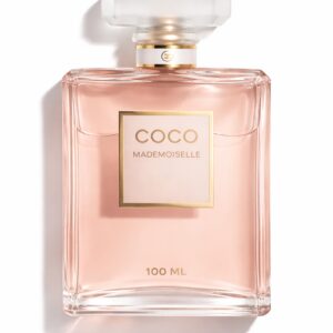 A bottle of Coco Mademoiselle perfume with a pink hue.