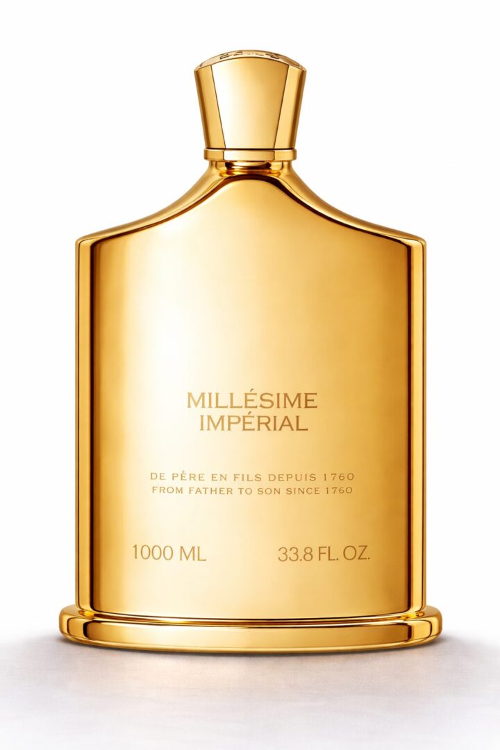 Elegant gold bottle of Millesime Imperial perfume with sleek design.