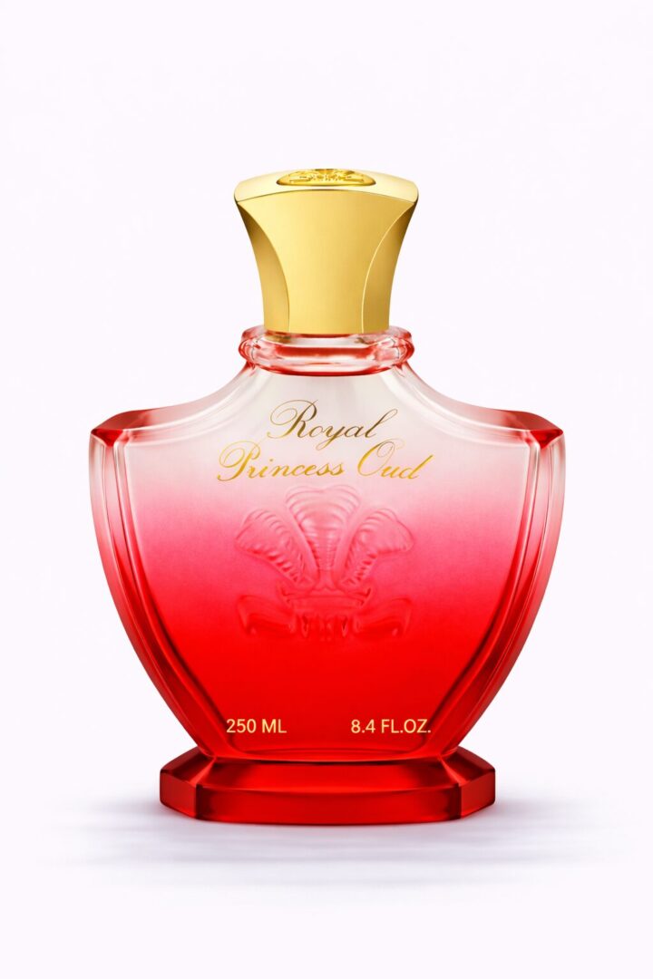 Elegant red and gold perfume bottle with floral engraving.