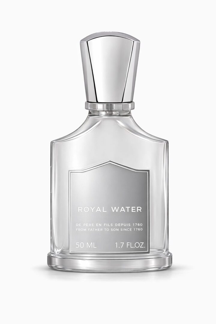 Elegant clear bottle of floral water with silver cap.