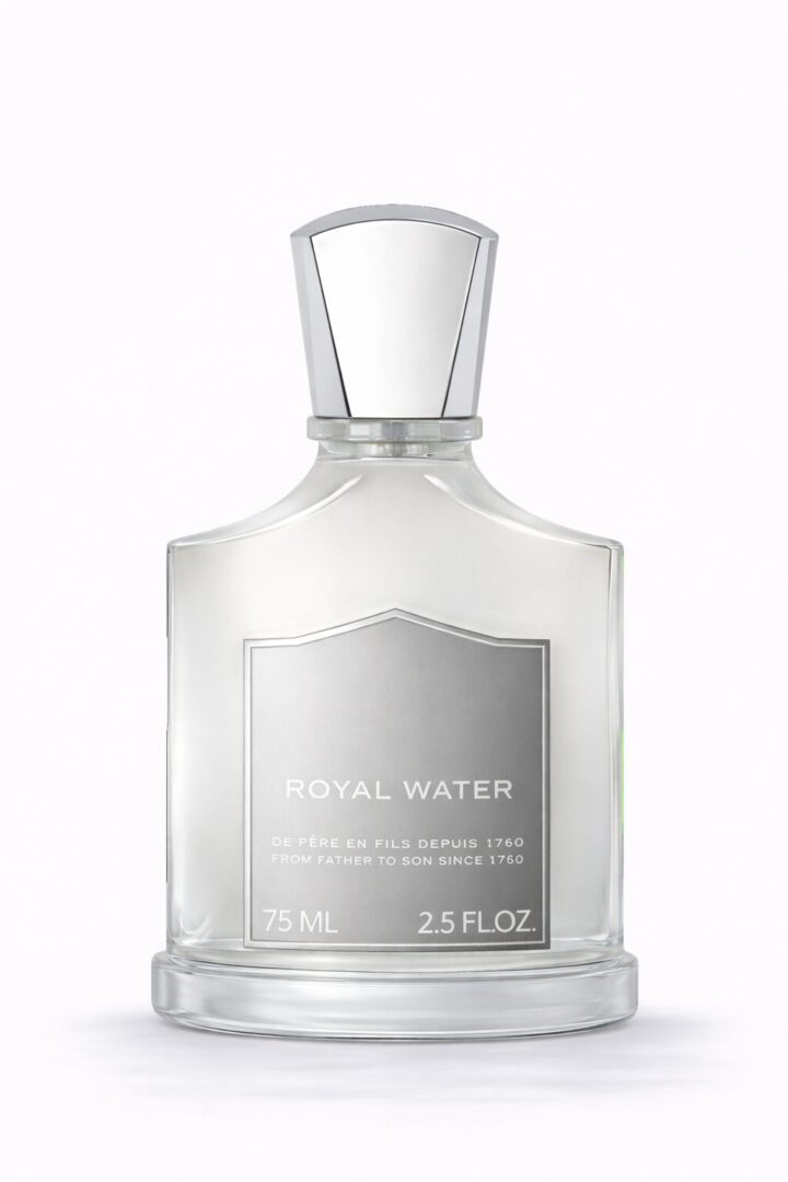 A clear glass perfume bottle with a silver cap and label.