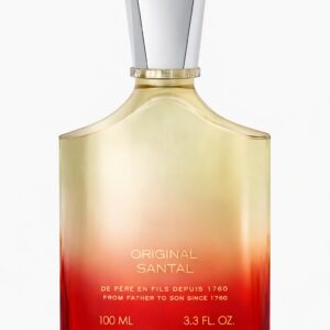 Elegant bottle of Chloé Nomade perfume with soft gradient colors.