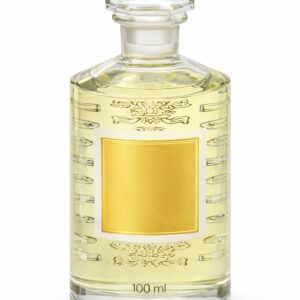 Clear glass bottle with yellow liquid and blank yellow label.
