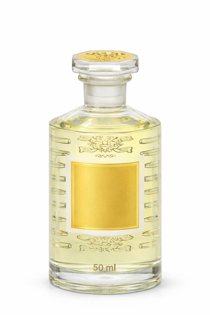 Elegant glass perfume bottle with a gold label and stopper.