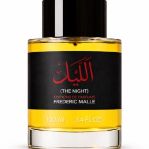 Bottle of Frederic Malle perfume named "The Night" with yellow liquid.